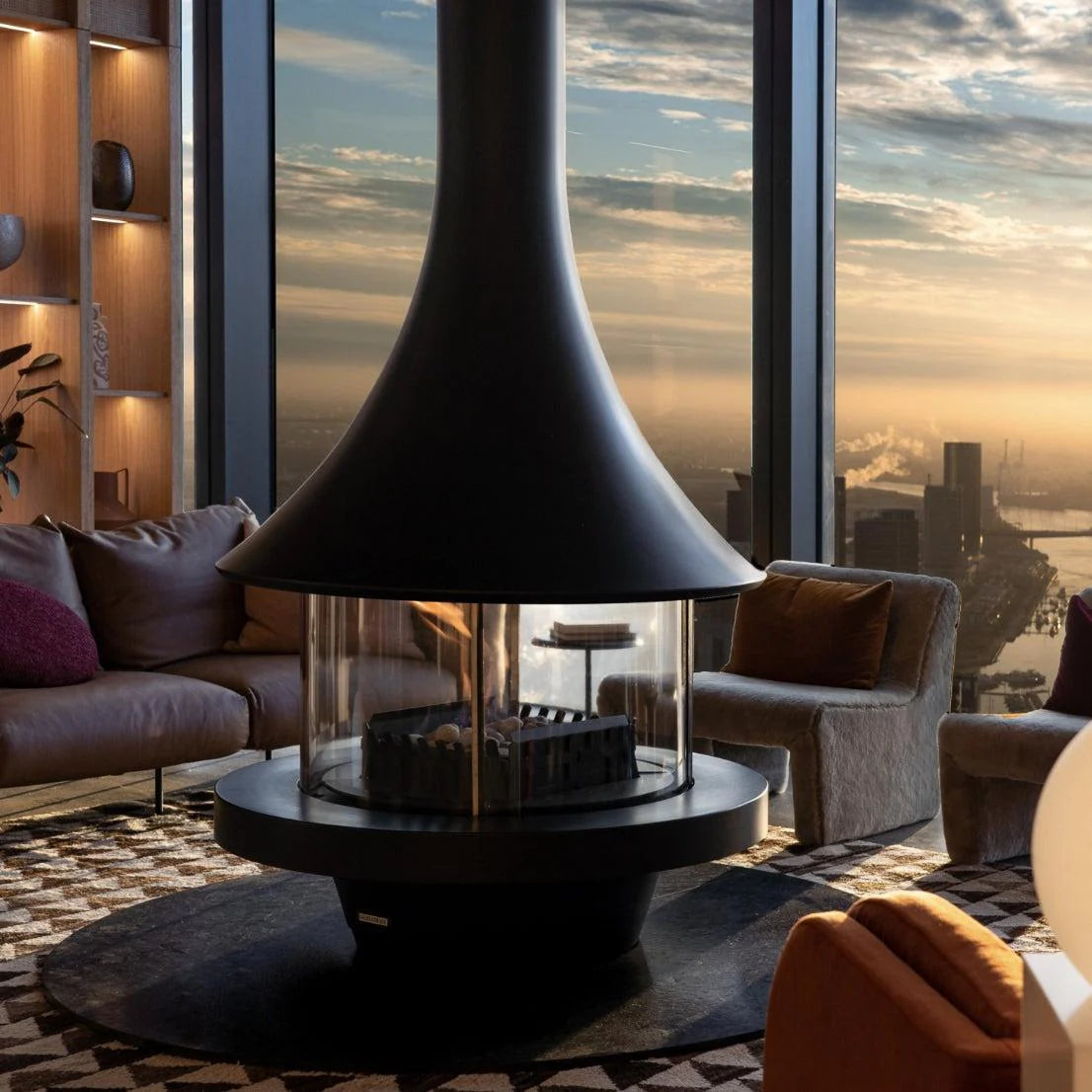 Bordelet Eva 992 central hanging gas fireplace in black with sleek modern design and visible glass front.