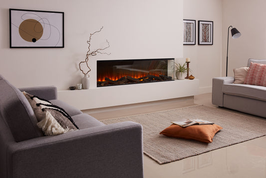 British Fires New Forest 1600 electric fireplace with modern design and realistic flame effect in a cozy living room setting.