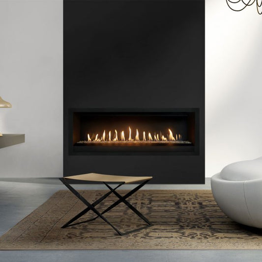 Lopi Probuilder 54-inch gas fireplace with modern linear design and glass front, installed in a contemporary living room setting.
