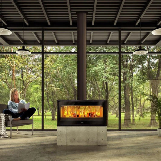 Lacunza Verona freestanding wood fireplace with glass door and modern design, showcased in a cozy living room setting.