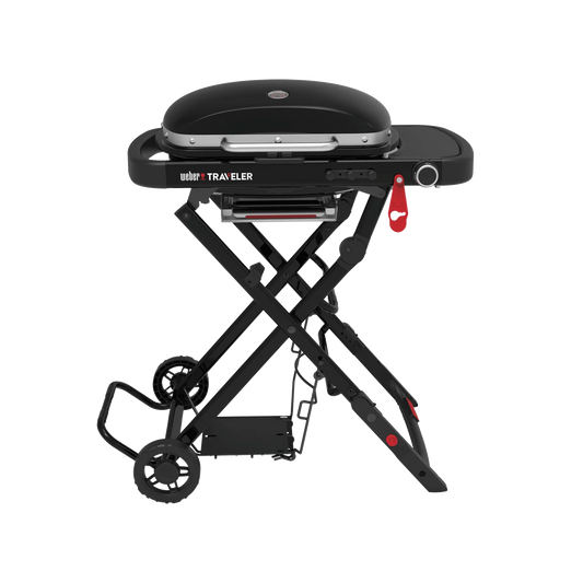 Black Weber Traveler portable gas grill with compact design and metal lid, perfect for outdoor cooking and travel.