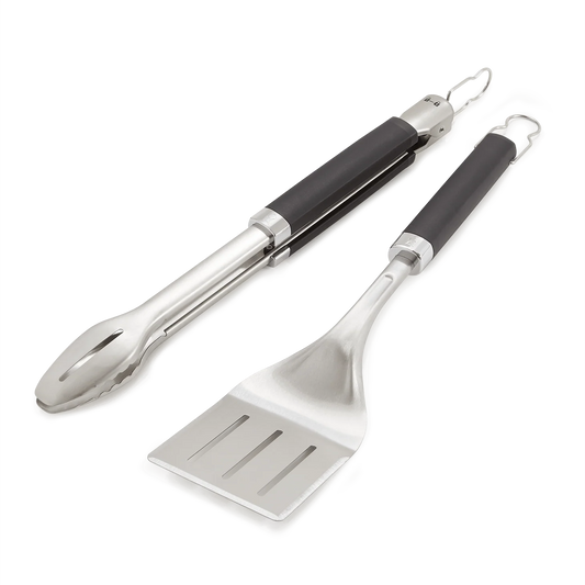 Weber 2-piece tool set with tongs and spatula, stainless steel utensils for grilling and cooking, displayed on a white background.