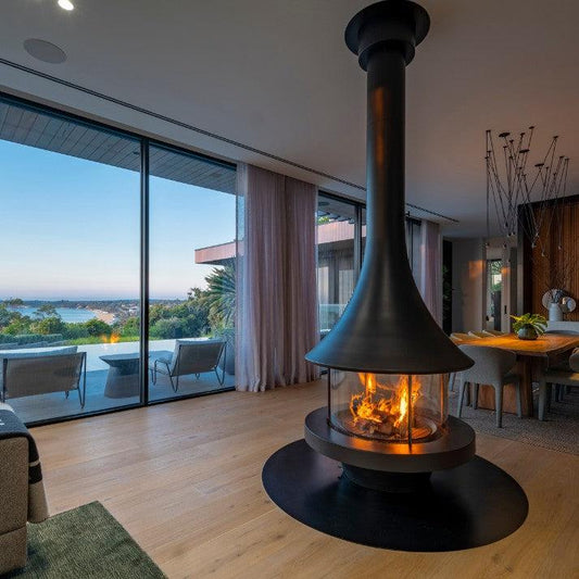 Bordelet Eva 992 central hanging wood fireplace in grey, showcasing its modern design and sleek structure.