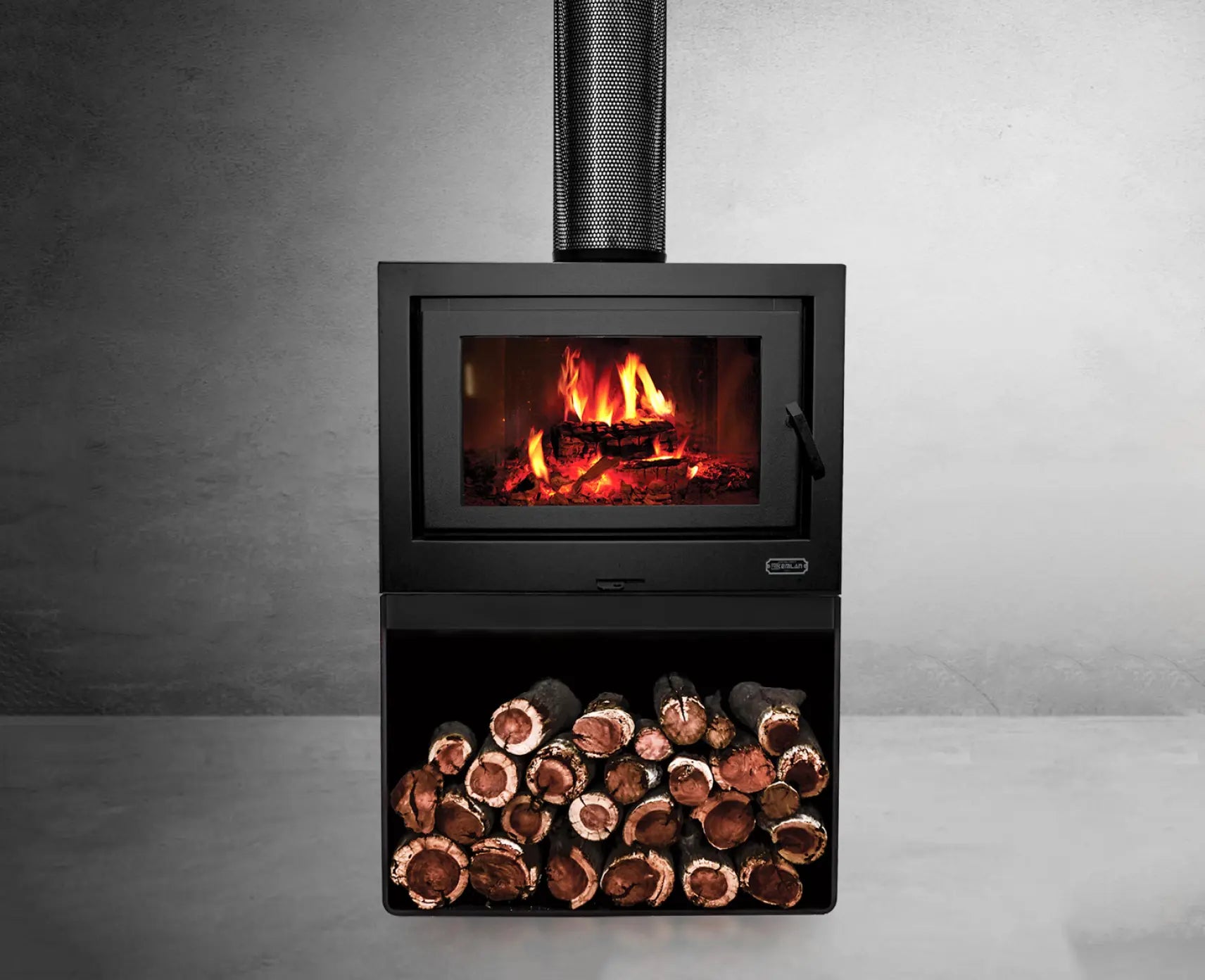 Black Kemlan Cube freestanding wood fireplace with Meridian base, showcasing modern design and clean lines.