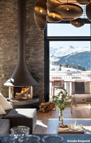 Bordelet Zelia 908 wall-mounted wood fireplace with custom finish, sleek design and modern appearance in a contemporary interior.