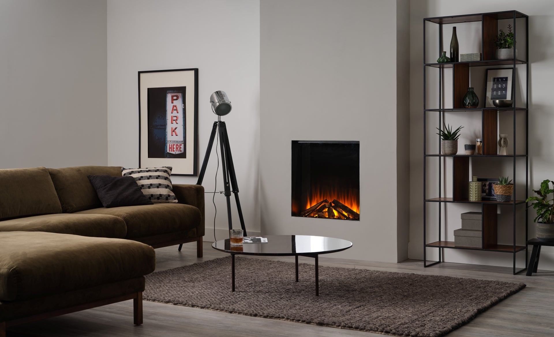 British Fires New Forest 650 SQ Deluxe electric fireplace with realistic log display and modern design for cozy home ambiance.