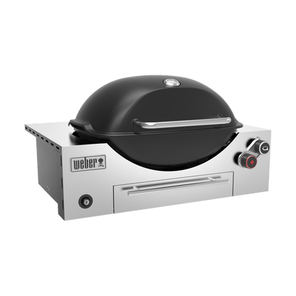 Black Weber Built-in Q+ Premium Q3600N+ gas barbecue grill with stainless steel burners and control knobs.