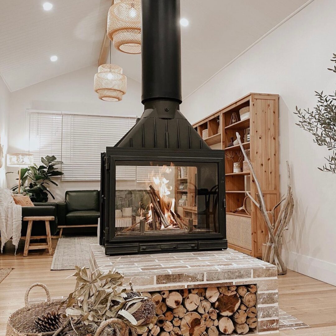 Seguin MultiVision 8000 double-sided wood fireplace with glass doors and modern design, showcasing its sleek, contemporary style.