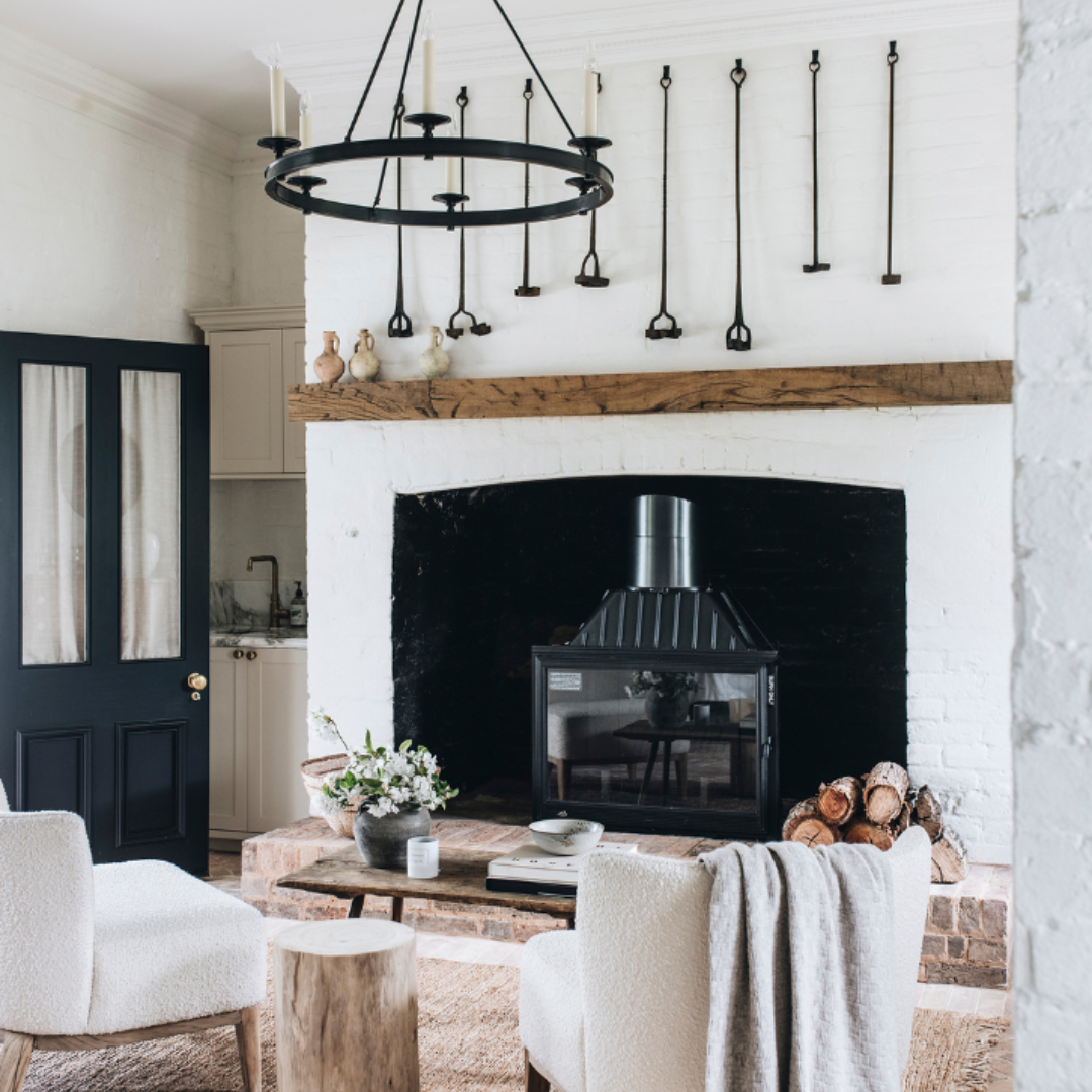 Seguin Super 9 cast iron wood fireplace with black line glass, showcasing its sleek design and sturdy construction.