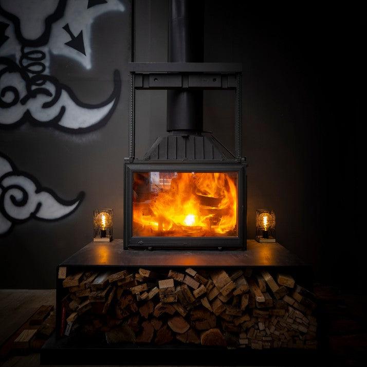 Seguin Super 9 cast iron wood fireplace with lift door and swing door, designed for efficient home heating.