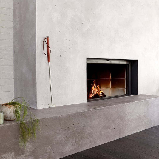Built-in STUV 21-135 wood fireplace showing sleek design and modern heating features.