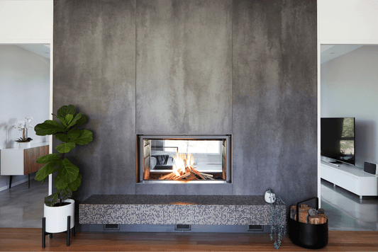 Stuv 21-125 DF wood fireplace with modern design, featuring a large glass front and black metal frame.