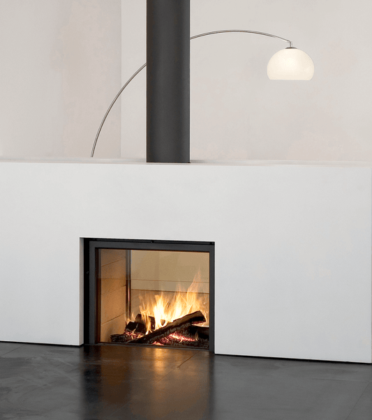Stuv 21 inbuilt wood fireplace with sleek design, showing the fireplace opening and modern interior finish.