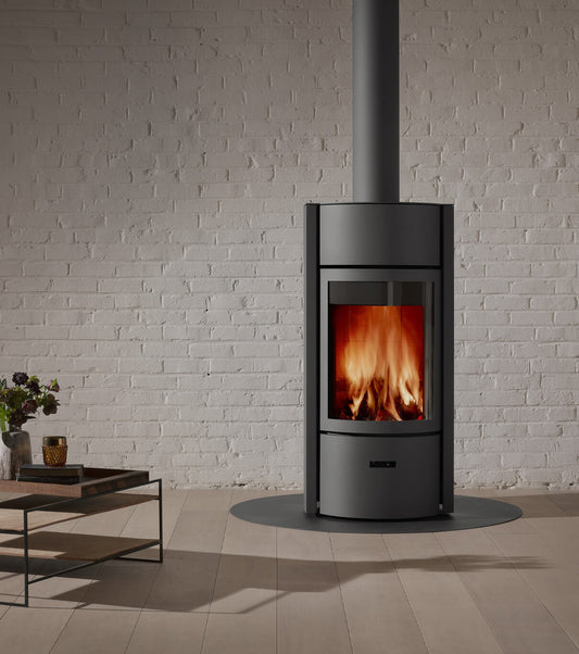Stuv 30 wood fireplace with a sleek modern design and slow combustion feature, showcasing its clean-burning efficiency.
