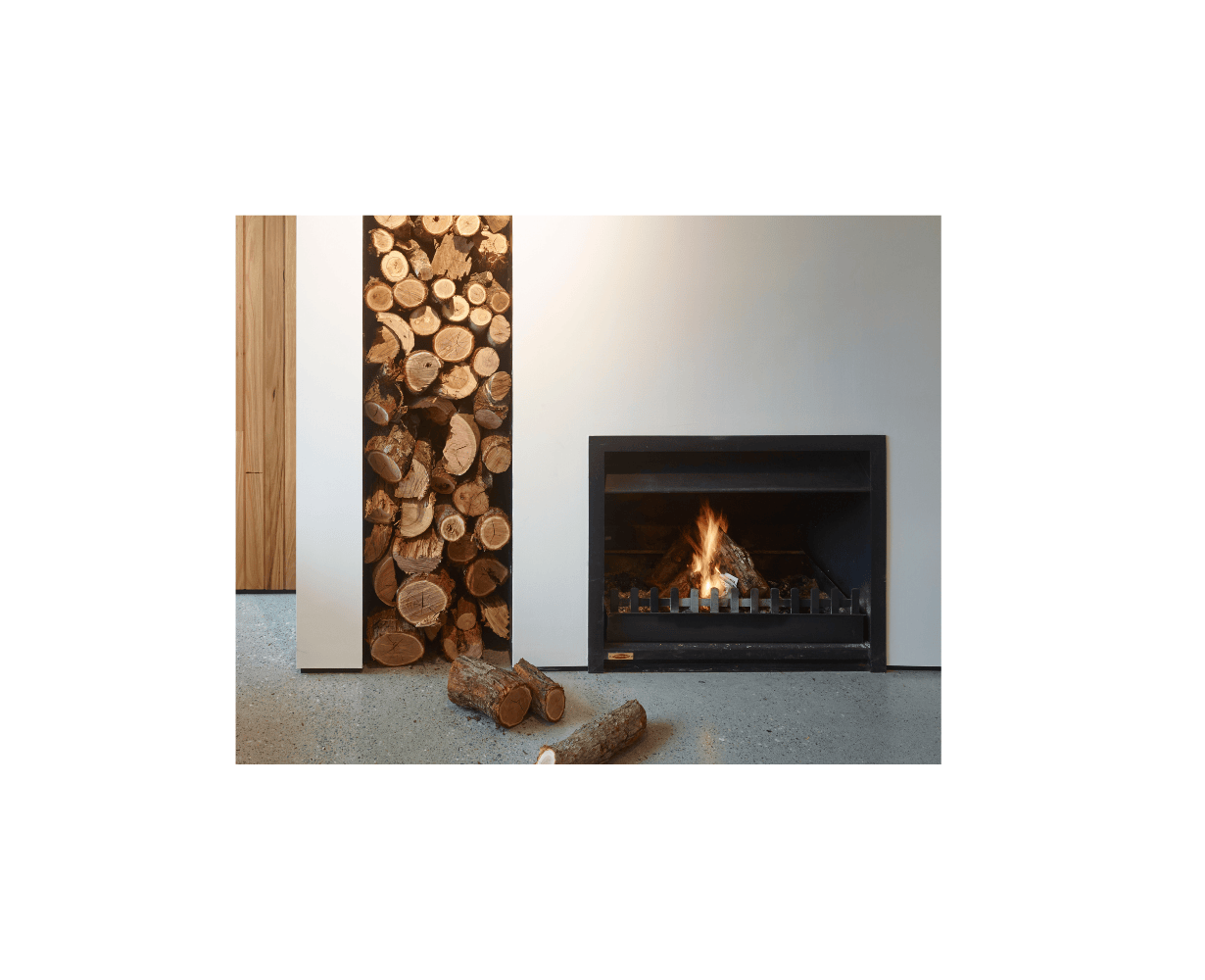 Jetmaster 850 wood fireplace insert with installation instructions, showcasing a sleek, built-in wood-burning fireplace design.