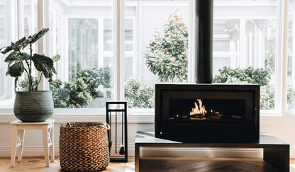 Kemlan Celestial 900 Series 2 wood fireplace with fixed handle, freestanding design, showcasing sleek modern style and black finish.