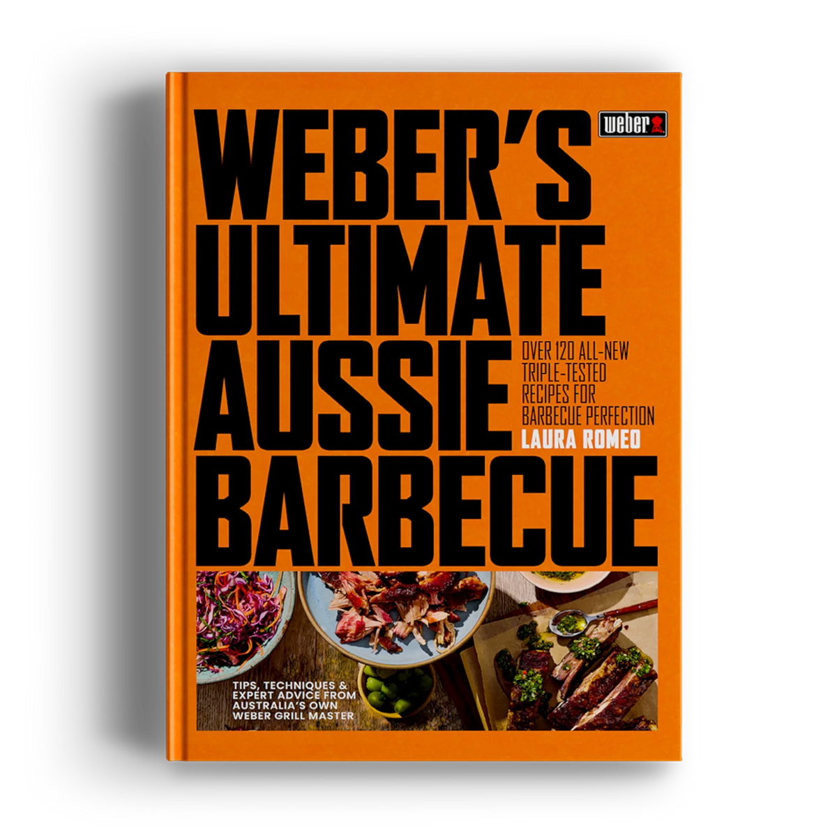 Flat lay of Weber's Ultimate Aussie Barbecue Cookbook and BBQ accessories, featuring grilling tools and recipe book from BBQ and Fireplace Centre.