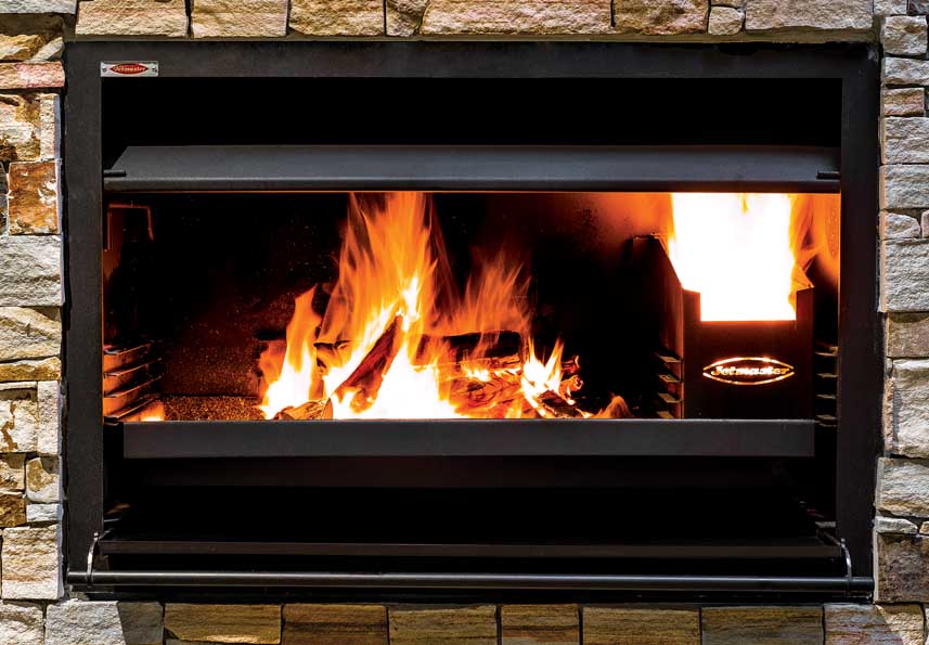 Jetmaster Horizon 1000 contractor built-in wood fireplace, showcasing a sleek outdoor wood-fired BBQ with a modern design.