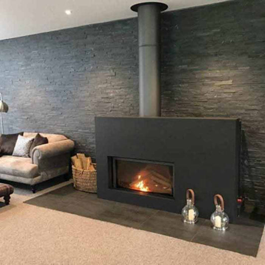 Dark interior of STUV 21-105 wood fireplace showing its sleek design and modern construction for cozy warmth.