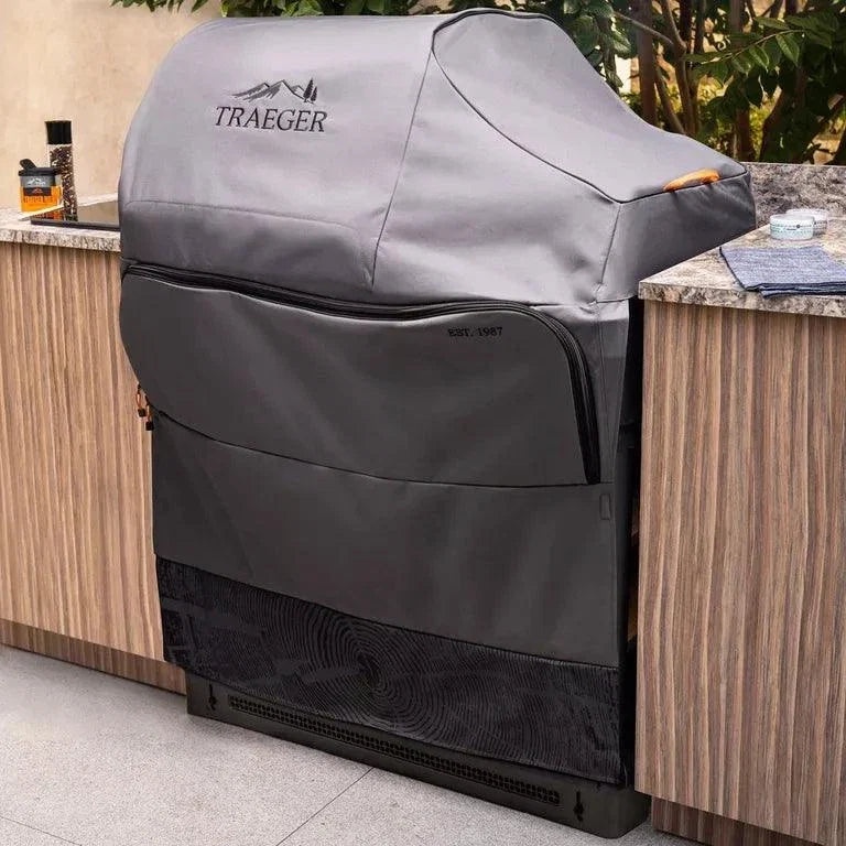 Traeger Timberline outdoor kitchen grill cover for built-in BBQ, durable weather-resistant accessory for Timberline grills.