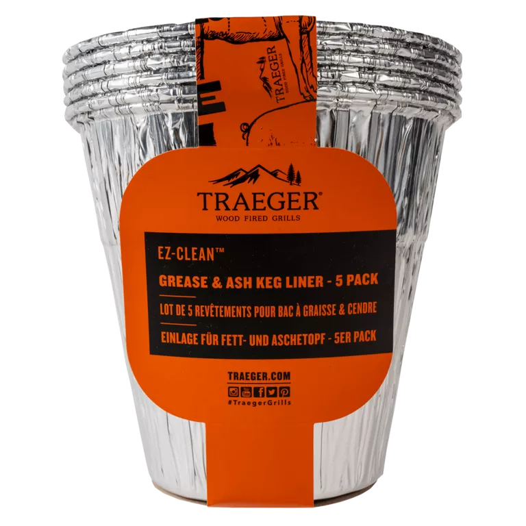 Traeger grease and ash keg liner 5-pack for BBQ accessories, shown in a studio setting with liners arranged neatly.