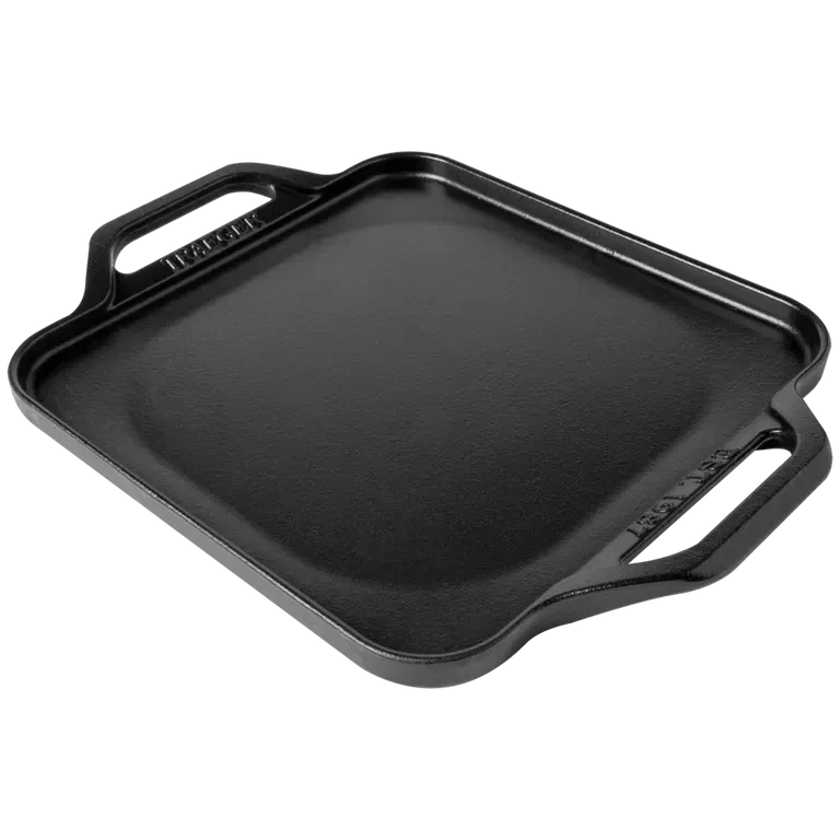 Traeger induction cast iron skillet for BBQ, shown from a studio angle, durable cookware ideal for grilling and outdoor cooking.