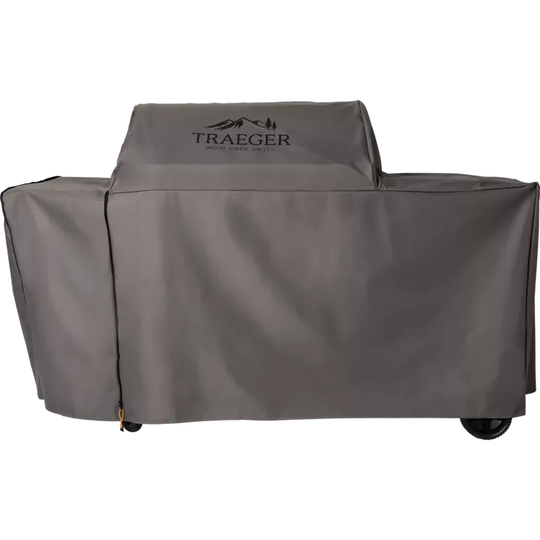 Traeger Woodridge XL full-length BBQ cover, unzipped, showing durable fabric and design for outdoor grill protection.