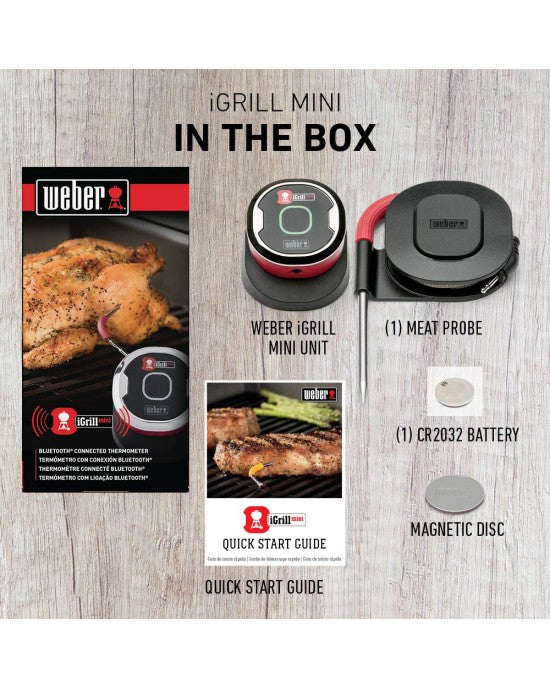 Weber iGrill Mini digital meat thermometer with probe and display for precise grilling temperature monitoring.