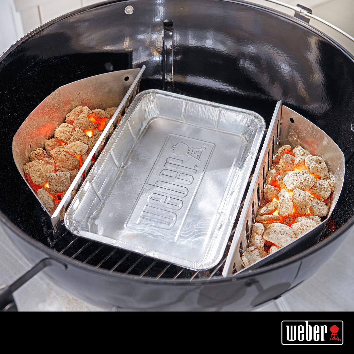 Large pack of 10 Weber drip pans for cleaning and maintenance, showing black, disposable pans with handles on a white background.