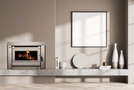 Jindara HAMERSLEY wood fireplace insert showing a black metal insert with a glass front and wood-burning interior.