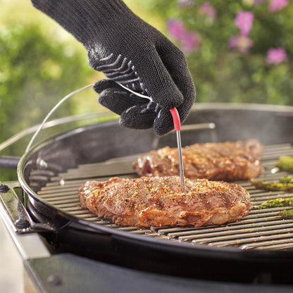 Weber Meat Probe thermometer for grilling and cooking, featuring a sleek stainless steel design and digital temperature display.